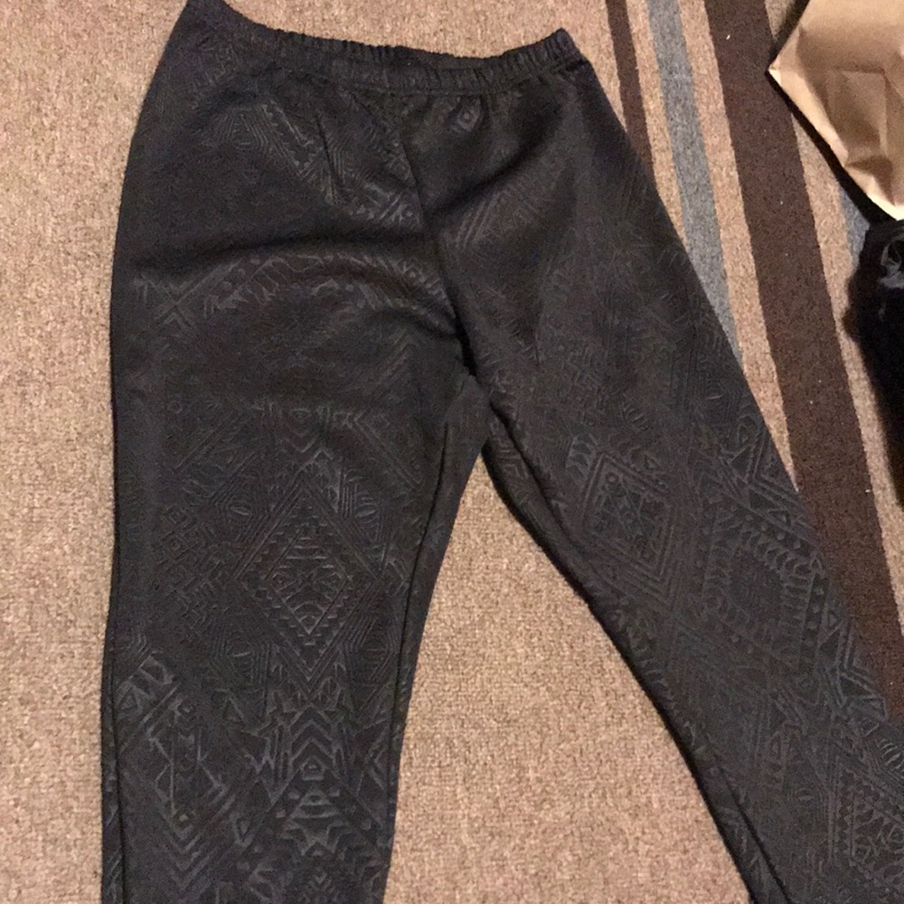 Black leggings with textured tribal design